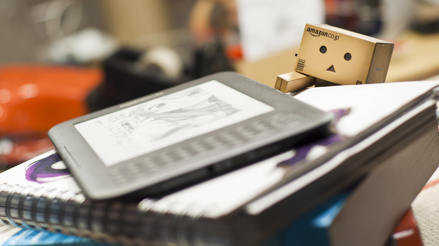 Danbo reaches for Kindle